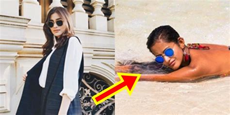 Liza Soberano is a summer goddess in rare bikini post .